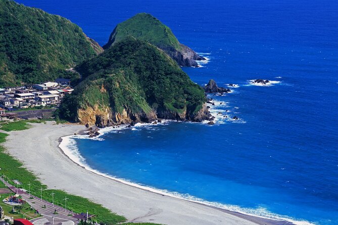9 Hour Northeast Coast Bay View Tour in Yilan - Dong’ao Bay’s curved shore and blue water