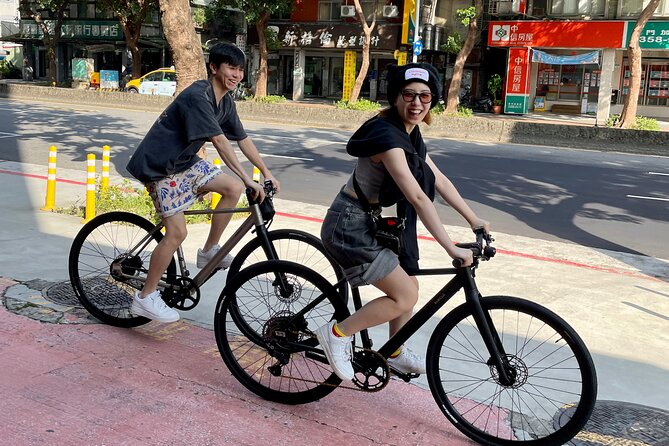 Best E-bike Cycling Tour in Taipei - Includes Local Food & Drinks - Taipei Civic Plaza, the Rainbow Walk, and two major landmarks