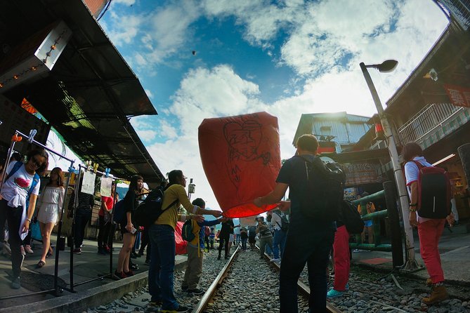 Private Tour to Jiufen, Yehliu Geopark, and Pingxi - Jiufen Old Street: stairs, snacks, and mountain-town atmosphere