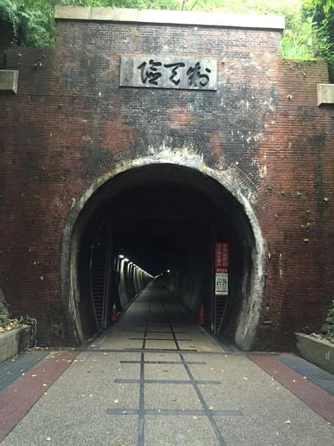 Taipei Private Spiritual Tour with Afternoon Tea & Cycling - Cycling through the Old Caoling Tunnel