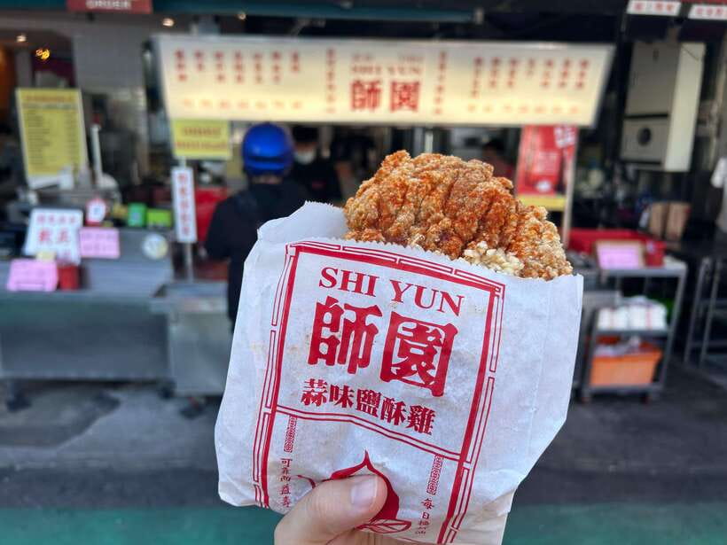 Taipei: Street Food & Hidden Eats Night Market Food Tour - Fried chicken and a walk through the university district