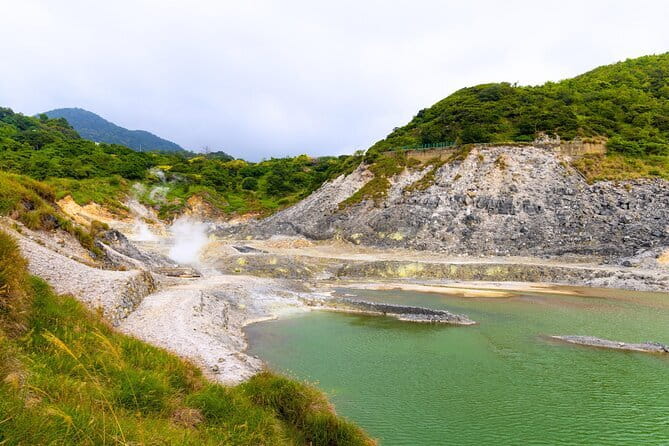 Yangmingshan, Yehliu, Jiufen & Shifen Private Tour From Taipei - Shifen Waterfall: a broad curtain of falling water